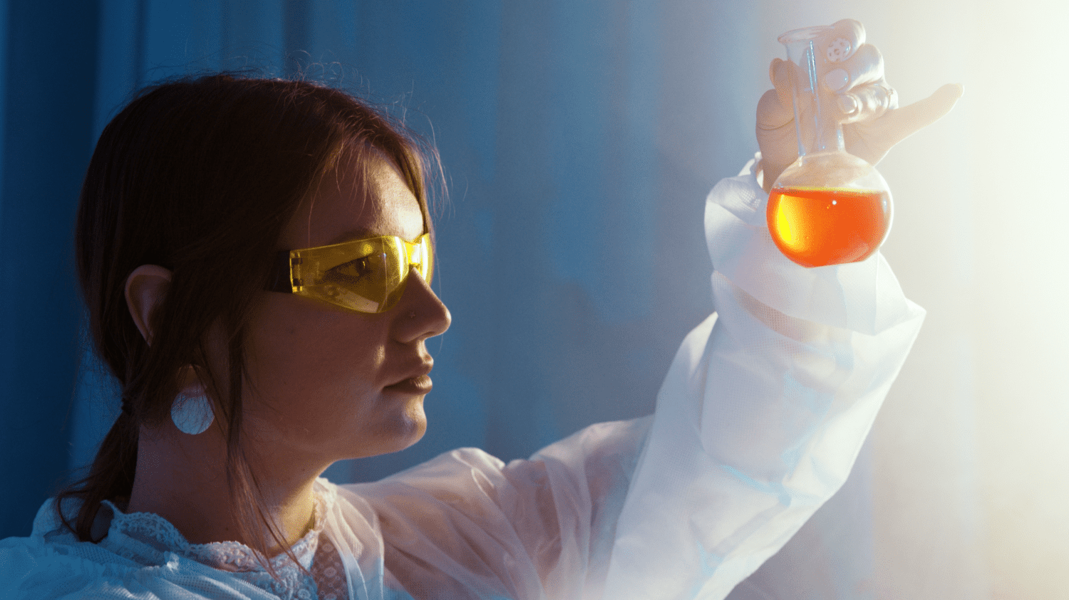 Biotech scientist with beaker