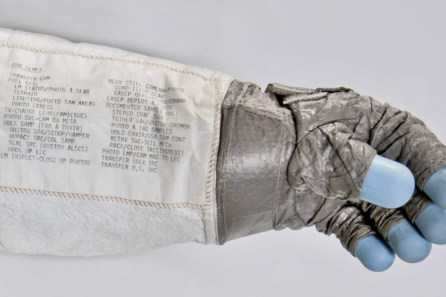 A sewn-on cuff checklist on astronaut Neil Armstrong's glove used when he walked on the moon. Photo: National Air and Space Museum
