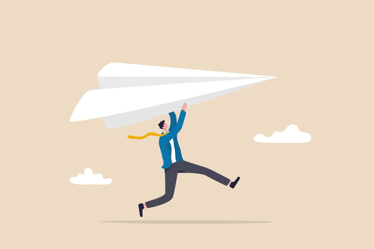 Start new business, startup or entrepreneurship, creativity and inspiration to achieve business success concept, ambitious businessman running about to throwing to launch big paper airplane origami.